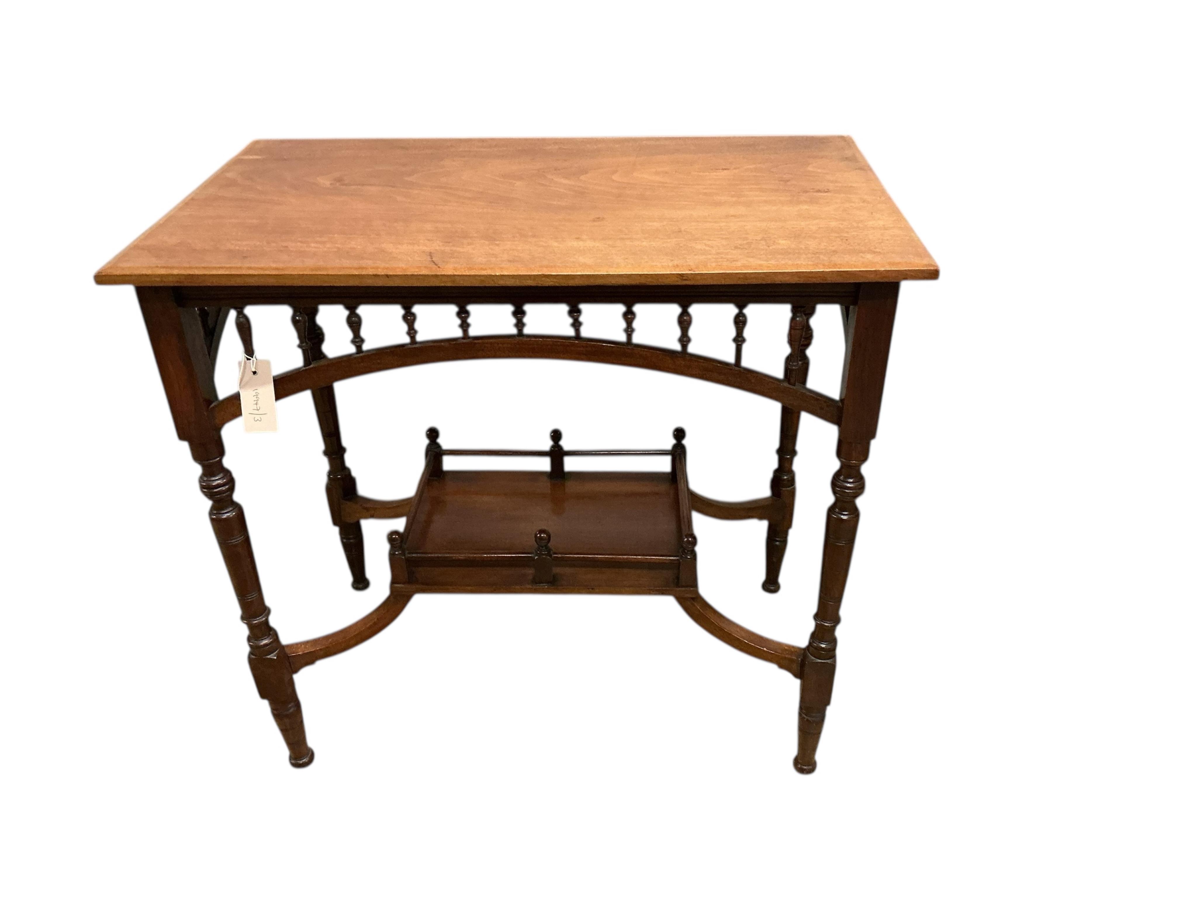 A Victorian Aesthetic Movement rectangular walnut two tier occasional table, width 74cm, depth 44cm, height 69cm